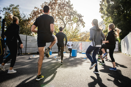 A group moving through a mat class together